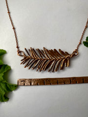 real redwood leaflet necklace encased in recycled copper infinity clasp simple wealth art made in usa electroplated redwood leaf sempervirens giant sequoia
