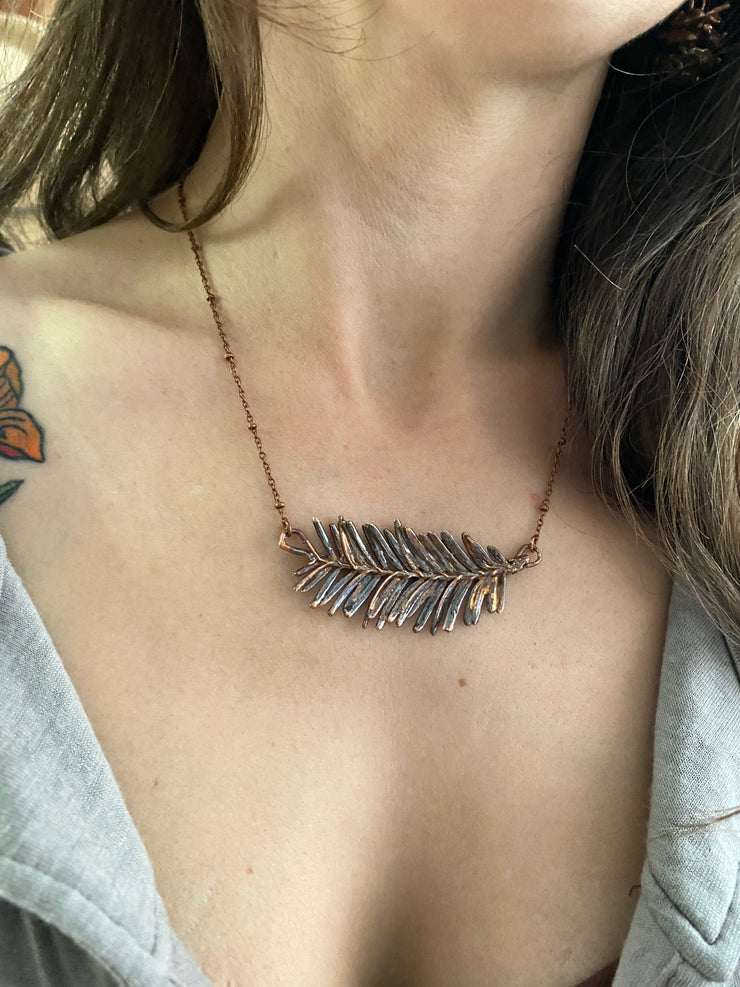 real redwood leaflet necklace encased in recycled copper infinity clasp simple wealth art made in usa electroplated redwood leaf sempervirens giant sequoia