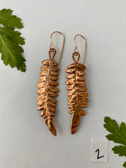real fern leaf earrings electroplated with recycled copper ans 14 karat gold by simple wealth art made in usa