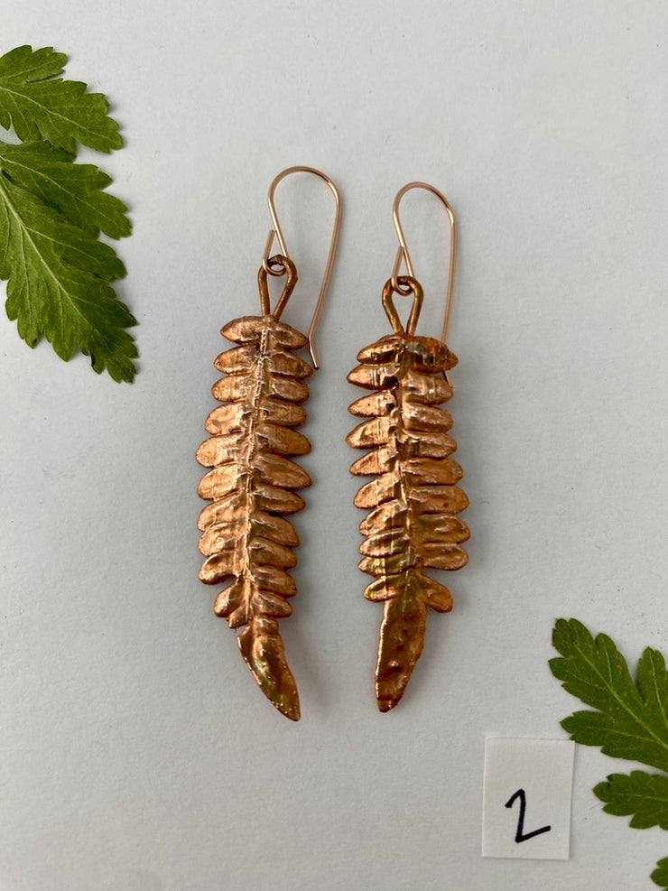 real fern leaf earrings electroplated with recycled copper ans 14 karat gold by simple wealth art made in usa