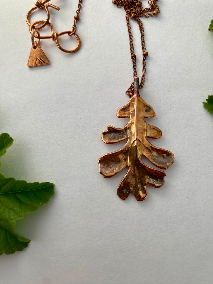 real oak leaf necklace encased in recycled copper infinity clasp simple wealth art made in usa electroplated oak leaf