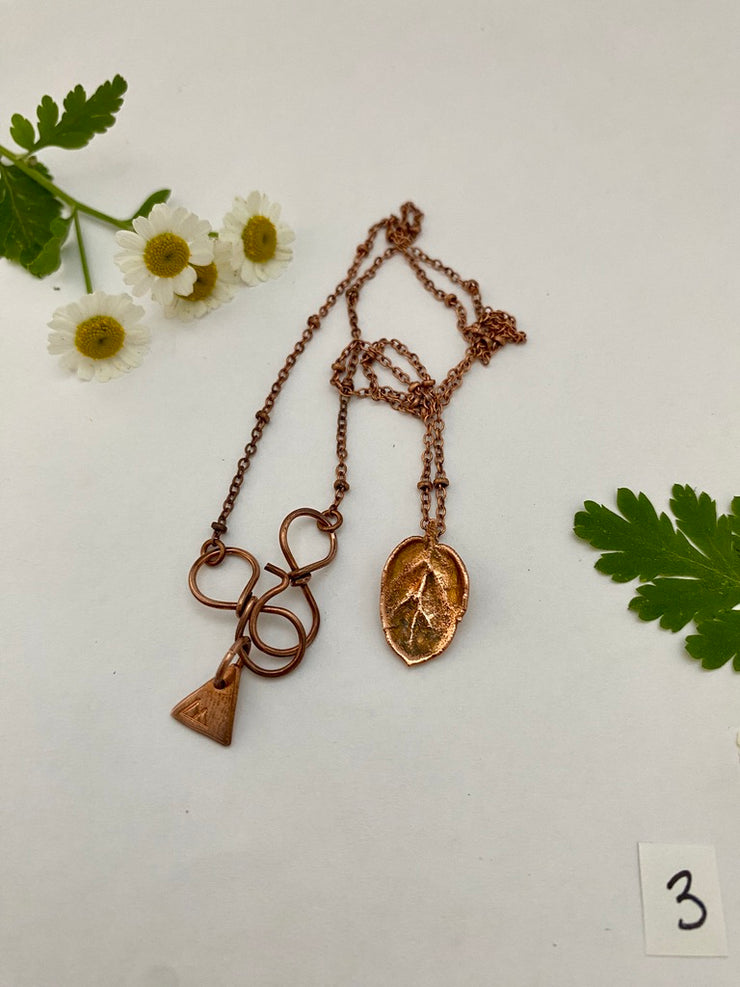 real oak leaf necklace encased in recycled copper infinity clasp simple wealth art made in usa electroplated oak leaf