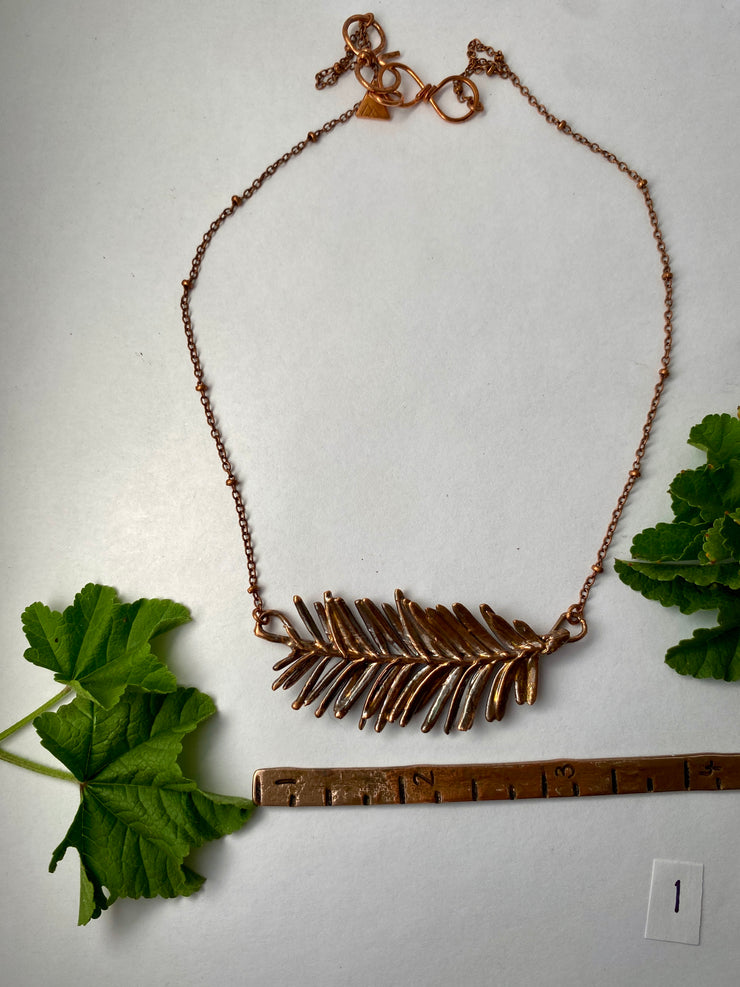 real redwood leaflet necklace encased in recycled copper infinity clasp simple wealth art made in usa electroplated redwood leaf sempervirens giant sequoia