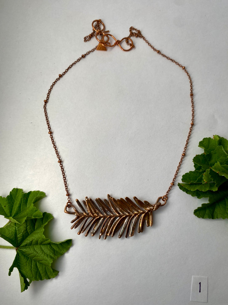 real redwood leaflet necklace encased in recycled copper infinity clasp simple wealth art made in usa electroplated redwood leaf sempervirens giant sequoia