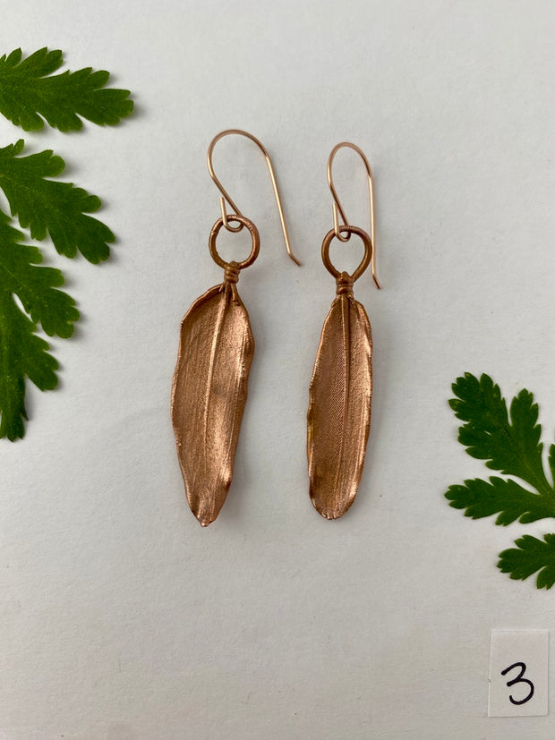 real feather earrings recycled copper electroplated feather earrings handmade 14 karat rose gold ear wires made in usa simple wealth art