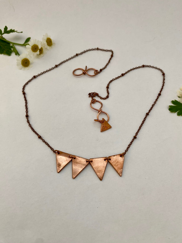 recycled copper pipe upcycled metal four triangle bunting necklace handmade in usa simple wealth art