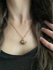 tiny snail shell electroplated in recycled copper with tiny quartz crystals made in usa simple wealth art