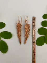 real fern leaf earrings electroplated with recycled copper ans 14 karat gold by simple wealth art made in usa