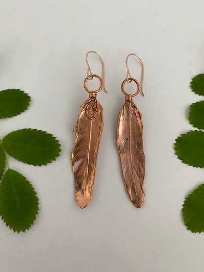 real feather earrings recycled copper electroplated feather earrings handmade 14 karat rose gold ear wires made in usa simple wealth art