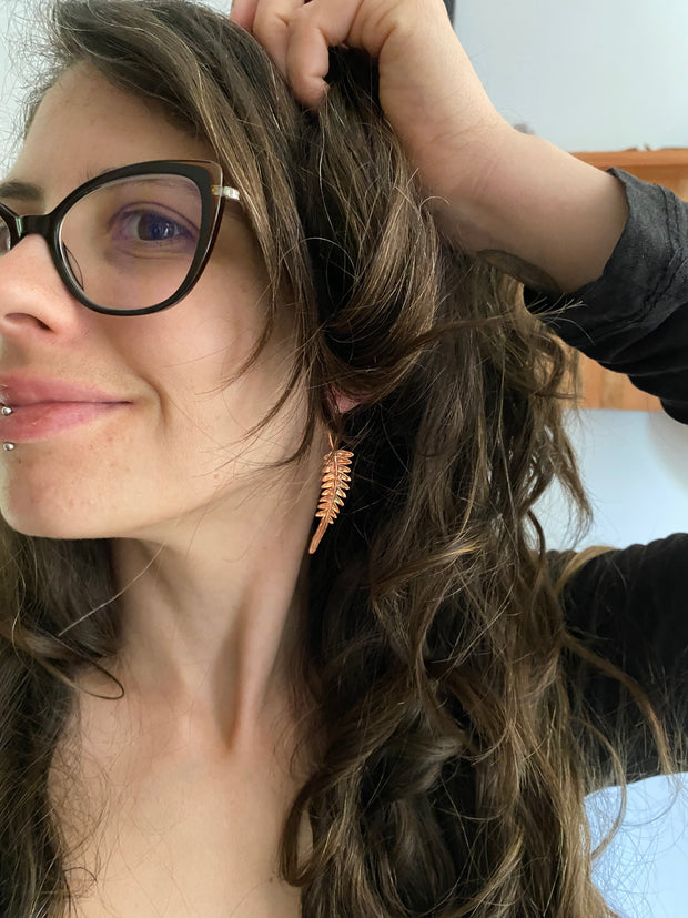 real fern leaf earrings electroplated with recycled copper ans 14 karat gold by simple wealth art made in usa