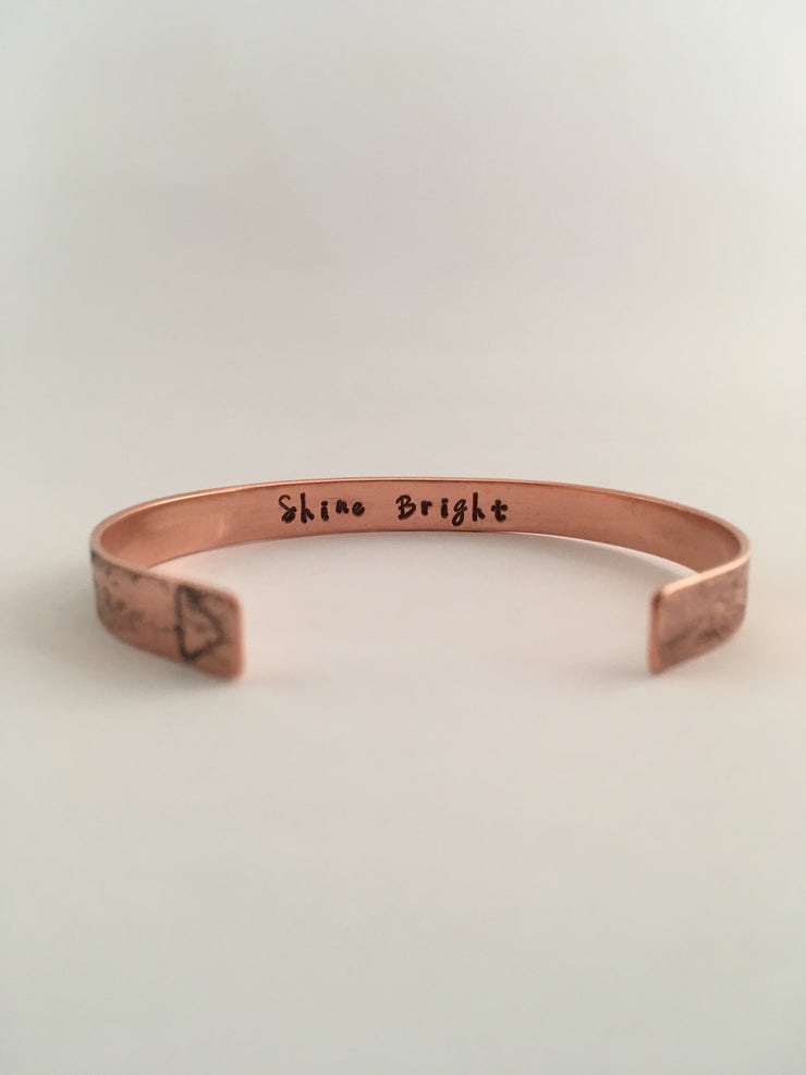 shine bright secret message recycled copper affirmation cuff unite to light charity fundraiser made in usa simple wealth art mantra band
