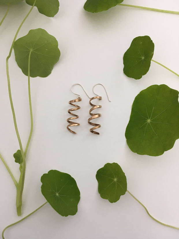spiral earrings made from brass drum cymbal simple wealth art