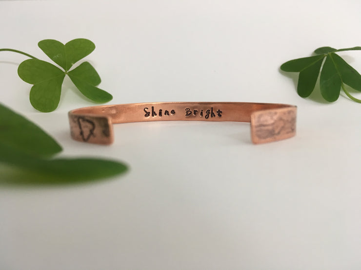 shine bright secret message recycled copper affirmation cuff unite to light charity fundraiser made in usa simple wealth art mantra band