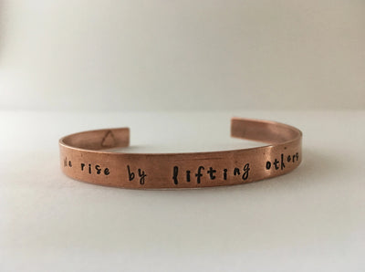 We rise by lifting others Recycled Copper Affirmation Bracelet